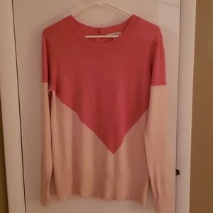 Pale orange and cream sweater